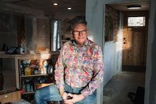 Charles Merredew works on his home in Merrickville, Ontario, where he plans to age in place. Photographed by Kaja Tirrul, in Merrickville ON, on December 18th, 2025.