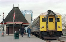 Passengers head towards the outgoing morning train at the Via Rail station in Victoria, B.C., in 2002. 