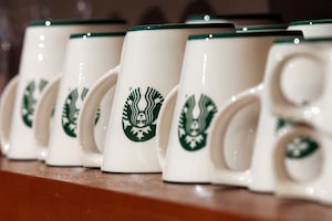 Starbucks new signature mugs are displayed during the Starbucks Investor Day event in New York City, U.S., January 29, 2026.  REUTERS/Brendan McDermid